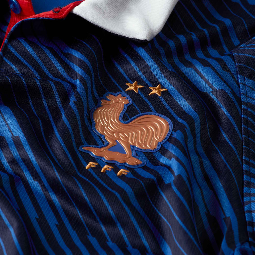 Nike Men's France DÃ©sirÃ© DouÃ© Home Stadium Jersey 2026 (Game Royal/Metallic Copper)
